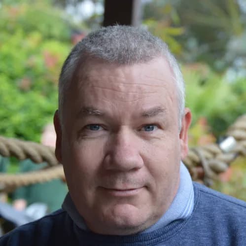 Kevin Mackay, who makes BoopBoops, outdoors in a garden.